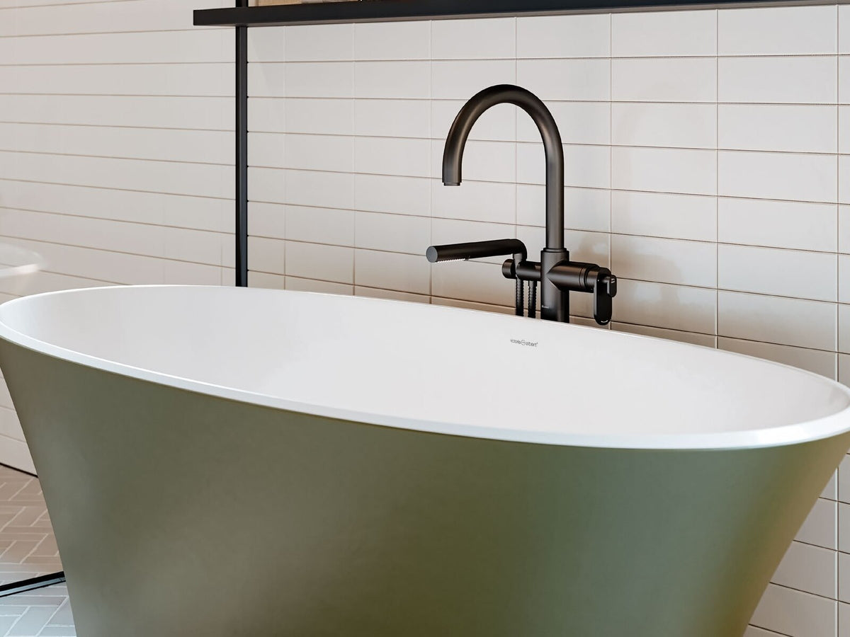 Riobel Arca bath with a freestanding tub and black faucet